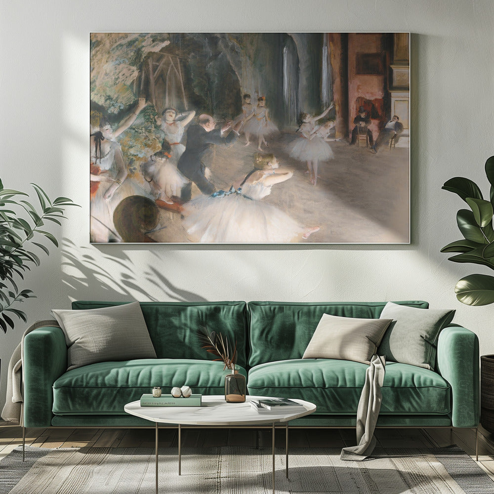 An impressionist painting depicting a ballet rehearsal on a stage. Ballerinas in white tutus practice and stretch while a male instructor in a dark suit directs them. The scene is viewed from the wings, with theatrical scenery in the background and onlookers seated to the right. Wall Art
