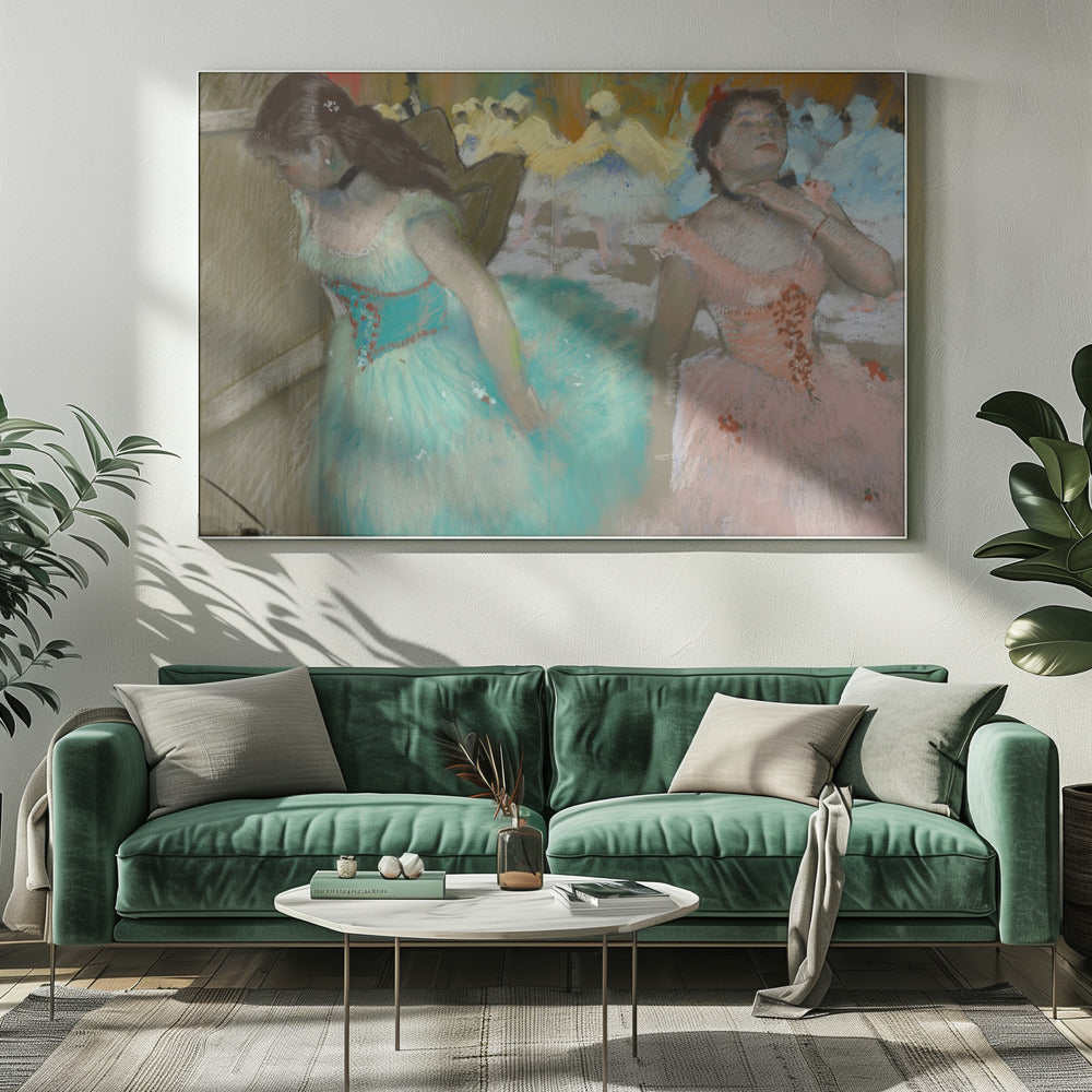 A framed pastel artwork by Edgar Degas depicting several ballerinas. In the foreground, a ballerina in a turquoise tutu looks down, while another in a pink tutu adjusts her collar with her eyes closed. In the background, more dancers in yellow and white are blurred on a stage. Wall Art