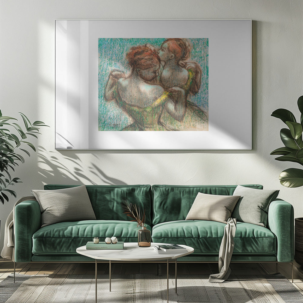 A framed pastel drawing by Edgar Degas, 'Two Dancers', depicting two ballerinas from behind. One dancer in a green dress with a yellow strap adjusts her costume, while another stands closely behind her against a textured turquoise background. The style is Impressionistic, capturing a candid moment. Artwork