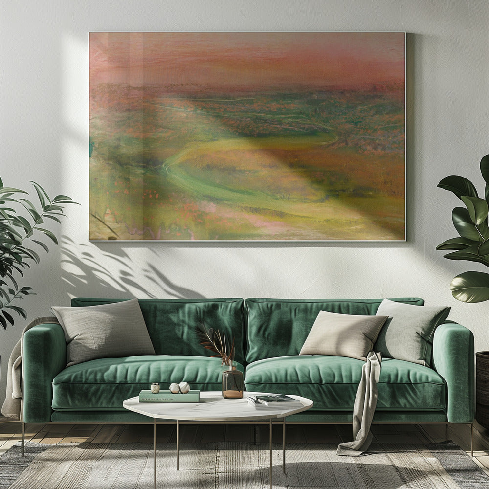 An abstract landscape painting in a silver frame. The artwork features a warm, peachy-orange sky above a rolling terrain of muted greens, yellows, and oranges. A faint, winding path meanders through the landscape, rendered in a soft, impressionistic style. Artwork