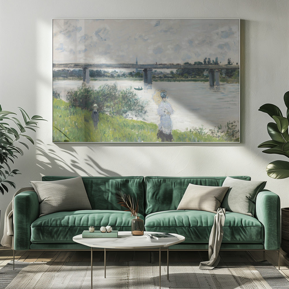 A scenic landscape art print by Claude Monet titled 'The Promenade With the Railroad Bridge, Argenteuil', depicting people on a promenade alongside a body of water with a railroad bridge in the background, characteristic of Impressionist style with soft colors and brushstrokes. Print