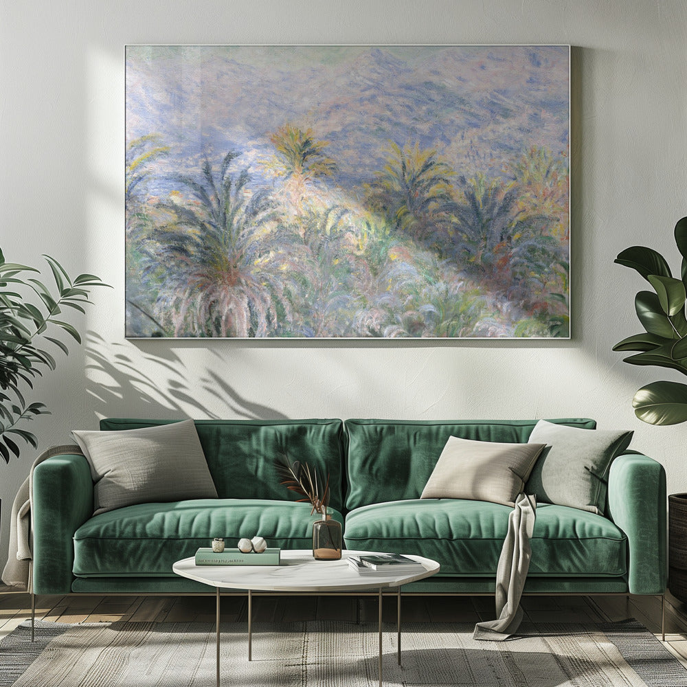 Impressionist painting 'View of Bordighera' by Claude Monet, featuring a lush foreground of green and yellow palm trees overlooking a hazy, sun-drenched coastal town and distant blue mountains, all rendered with soft, dappled brushstrokes and set within a silver frame. Artwork