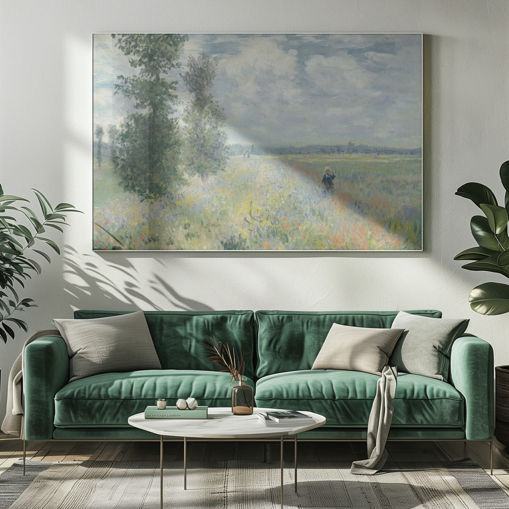 An impressionist painting by Claude Monet titled 'Poppy Field near Vétheuil', depicting a vast field of green grass dotted with red, yellow, and purple wildflowers. A figure in a white bonnet stands in the field to the right. Tall green trees are on the left, under a blue sky with fluffy white clouds. The entire scene is presented within a modern silver frame. Wall Art