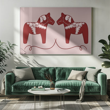 A symmetrical illustration of two red Swedish Dala horses facing each other against a light pink background. The horses are decorated with intricate white and pink folk art patterns. The artwork is presented within a silver frame. Artwork