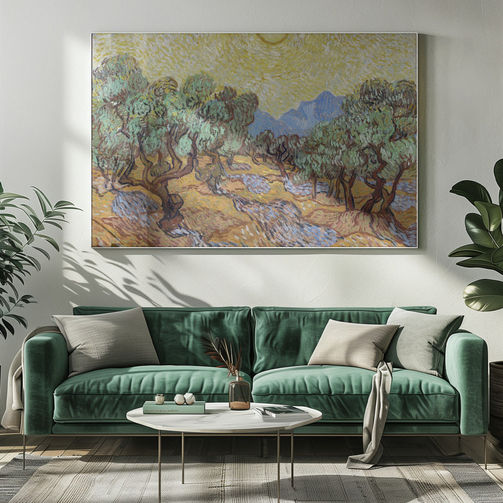 A framed Post-Impressionist painting by Vincent van Gogh depicting an olive grove under a bright yellow sun and sky. The olive trees have gnarled brown trunks and green leaves, set against a rolling landscape of ochre and lavender shadows. In the distance, blue mountains rise against the vibrant sky. The entire scene is painted with thick, energetic brushstrokes. Decor