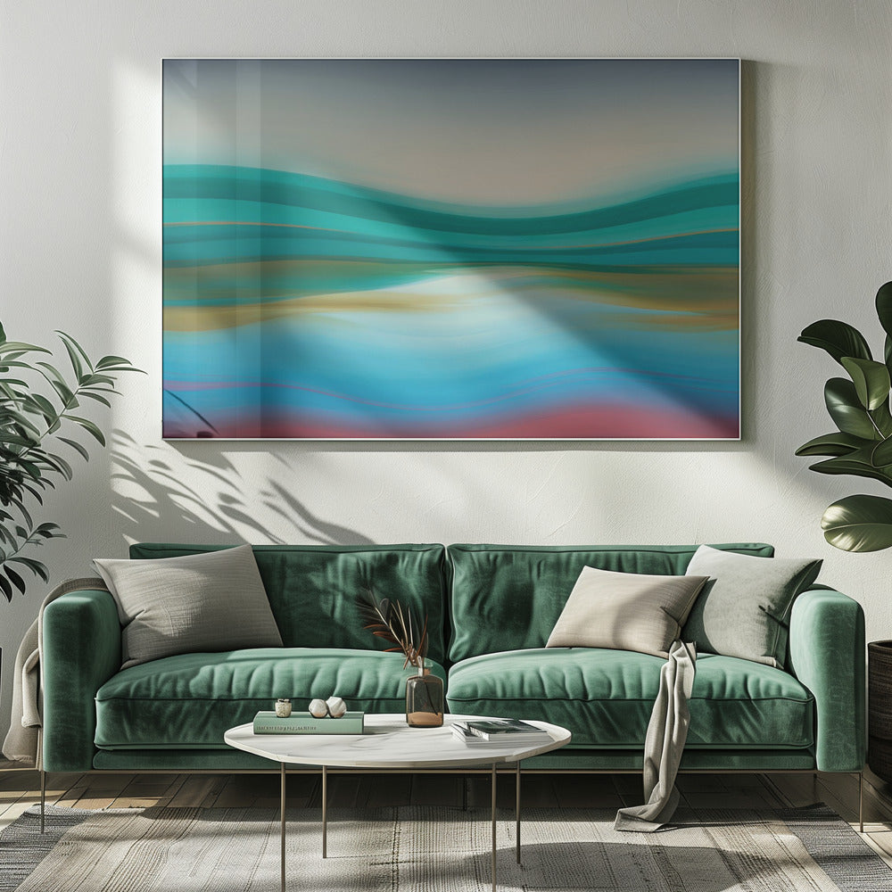 A framed abstract landscape painting featuring horizontal, flowing bands of color. The composition suggests a serene coastal scene with a light blue and cream sky over undulating waves of teal and green. The middle section shows reflections in shades of gold and aqua, while the bottom transitions from blue with thin red lines to a solid deep red-brown base. The entire piece is housed in a simple silver frame. Poster