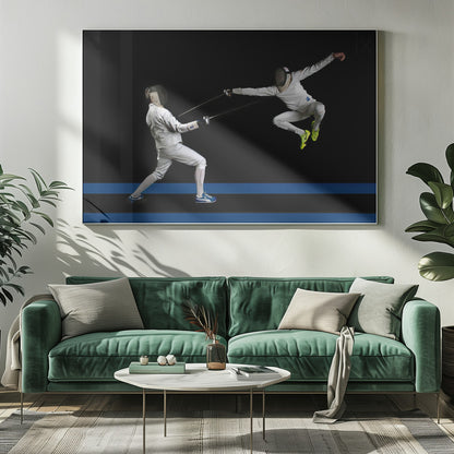 A dynamic action shot of two fencers in full white gear and masks dueling with foils against a stark black background. The fencer on the right is captured mid-air in a dramatic leap, while the fencer on the left lunges forward on a surface marked with blue lines. The image is enclosed in a silver frame. Artwork