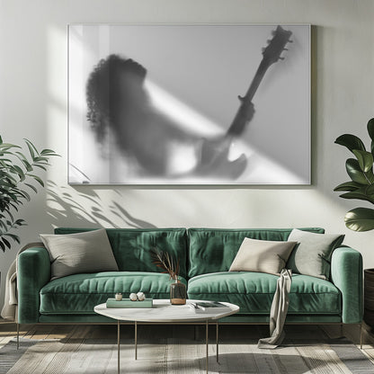 A framed, black and white photograph showing the blurry silhouette of a rock guitarist with long curly hair, head thrown back in passion while holding an electric guitar against a stark white background. Poster
