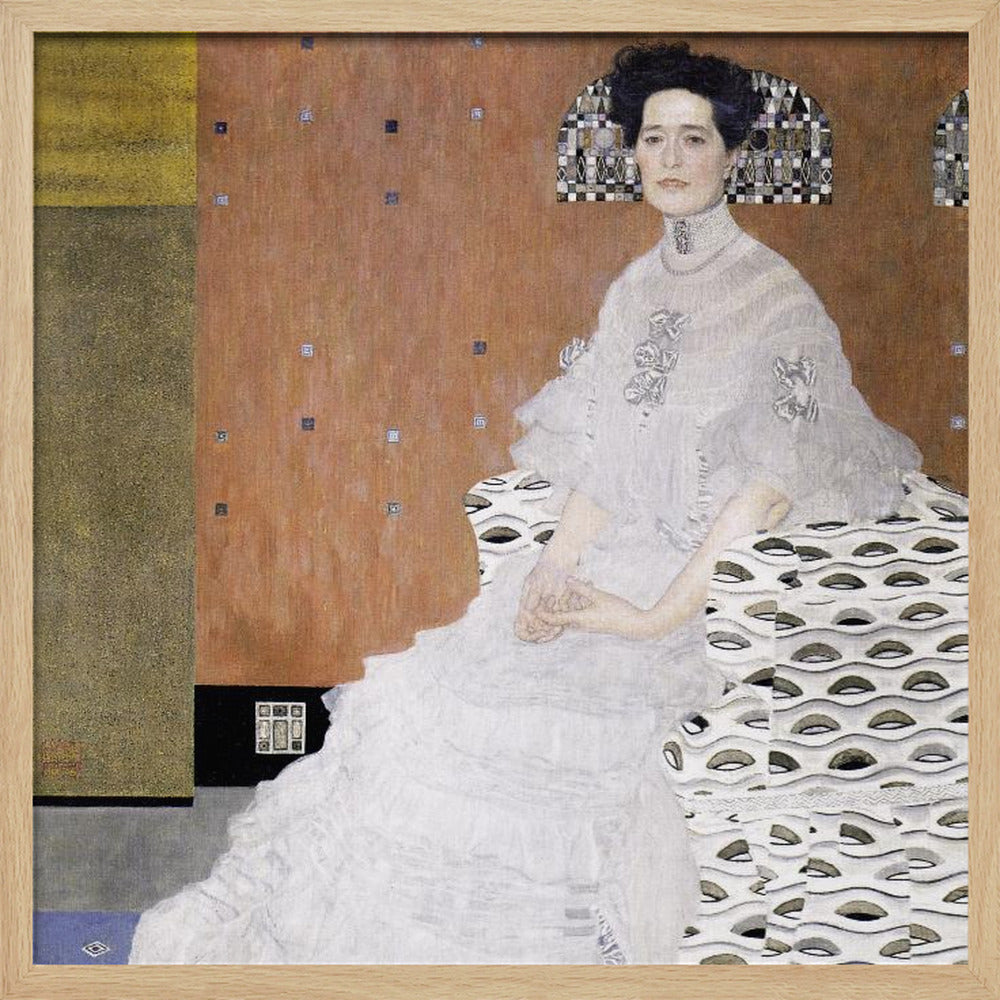 A framed print of Gustav Klimt's 'Portrait of Fritza Riedler'. A woman with dark upswept hair wearing a flowing white gown sits in a patterned armchair against a geometric, earth-toned background. Decor