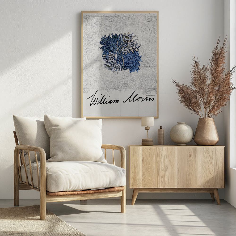 A framed vintage art print by William Morris. The artwork showcases a central colored sample of an intricate blue, white, and gold floral and foliage pattern, laid over a faint grayscale sketch of a similar repeating design. Below, the artist's name 'William Morris' is written in a large, black, cursive script. Print