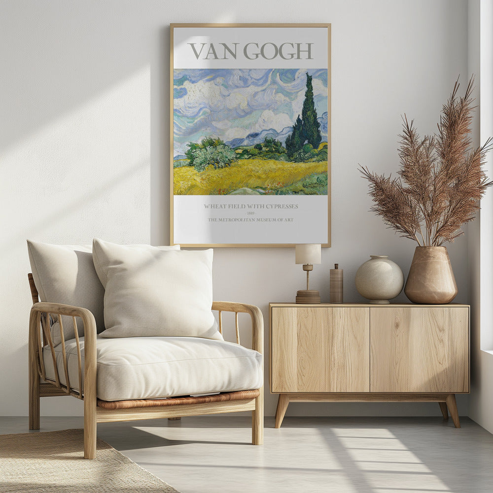 A framed museum poster of Vincent van Gogh's 'Wheat Field with Cypresses.' The impressionist painting depicts a golden wheat field under a swirling blue sky, with dark green cypress trees to the right and distant blue mountains. Decor