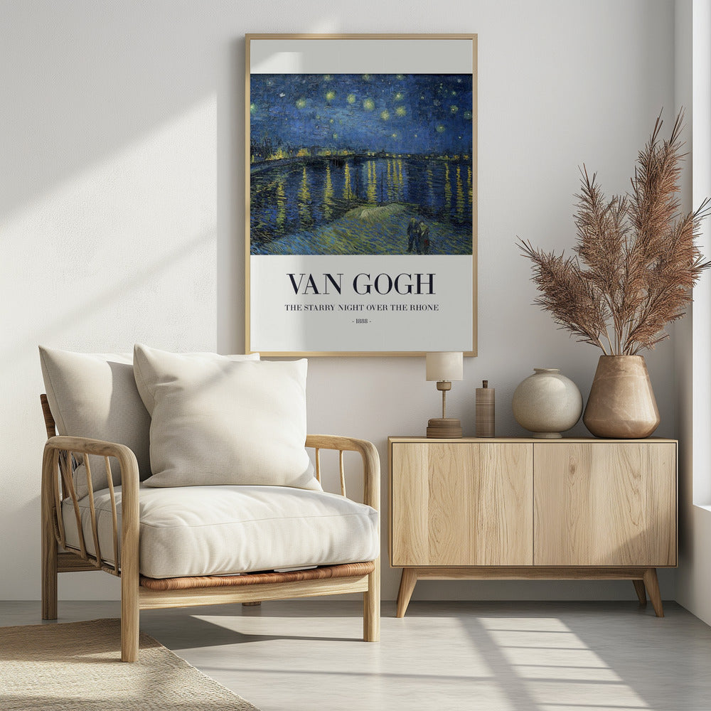 A framed poster of Vincent van Gogh's famous painting, 'The Starry Night Over the Rhone' from 1888. The painting depicts a deep blue night sky filled with bright yellow stars, reflected in the water below. In the foreground, a couple strolls along the riverbank. The title and artist's name are printed below the image on a white background. Wall Art