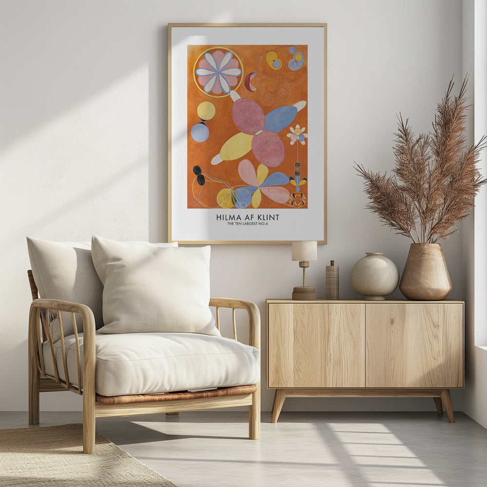 An art poster of Hilma af Klint's painting 'The Ten Largest No.4'. The abstract artwork features colorful, biomorphic and floral shapes in pink, blue, and yellow against a vibrant orange background. The poster has a white border with the artist's name and title at the bottom, all framed in black. Decor