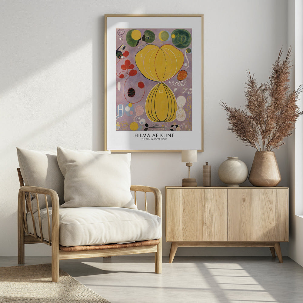 A framed art print of Hilma af Klint's abstract painting, 'The Ten Largest, No. 7.' The artwork features two large central yellow organic shapes on a lavender background, surrounded by smaller colorful forms including red clovers, green circles, and delicate spirals. Print