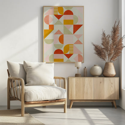 A framed piece of abstract geometric art featuring a grid pattern of shapes in a warm color palette. The design includes triangles, semicircles, and rectangles in shades of orange, yellow, pink, and sage green on a light cream background, creating a modern and playful composition. Poster