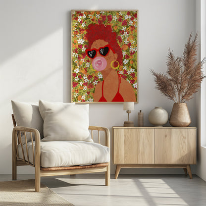 A vibrant pop art illustration of a woman with curly red hair, wearing red heart-shaped sunglasses and a matching bikini. She is blowing a pink bubblegum bubble against a busy background of strawberries and white flowers. Poster