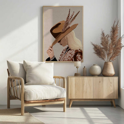 A graphic illustration of a blonde woman in profile, tipping a large brown fedora-style hat with feathers. Her face is partially obscured by the hat. She is wearing a patterned brown and white jacket over a black top against a solid light beige background. Print