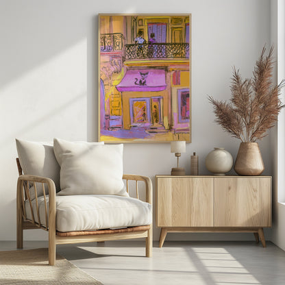 An impressionistic painting of a city street scene with a warm, yellow building. A stylized black cat with large eyes sits on a bright pink awning above a shop window. On the balcony above, two figures stand behind a black wrought-iron railing. Artwork