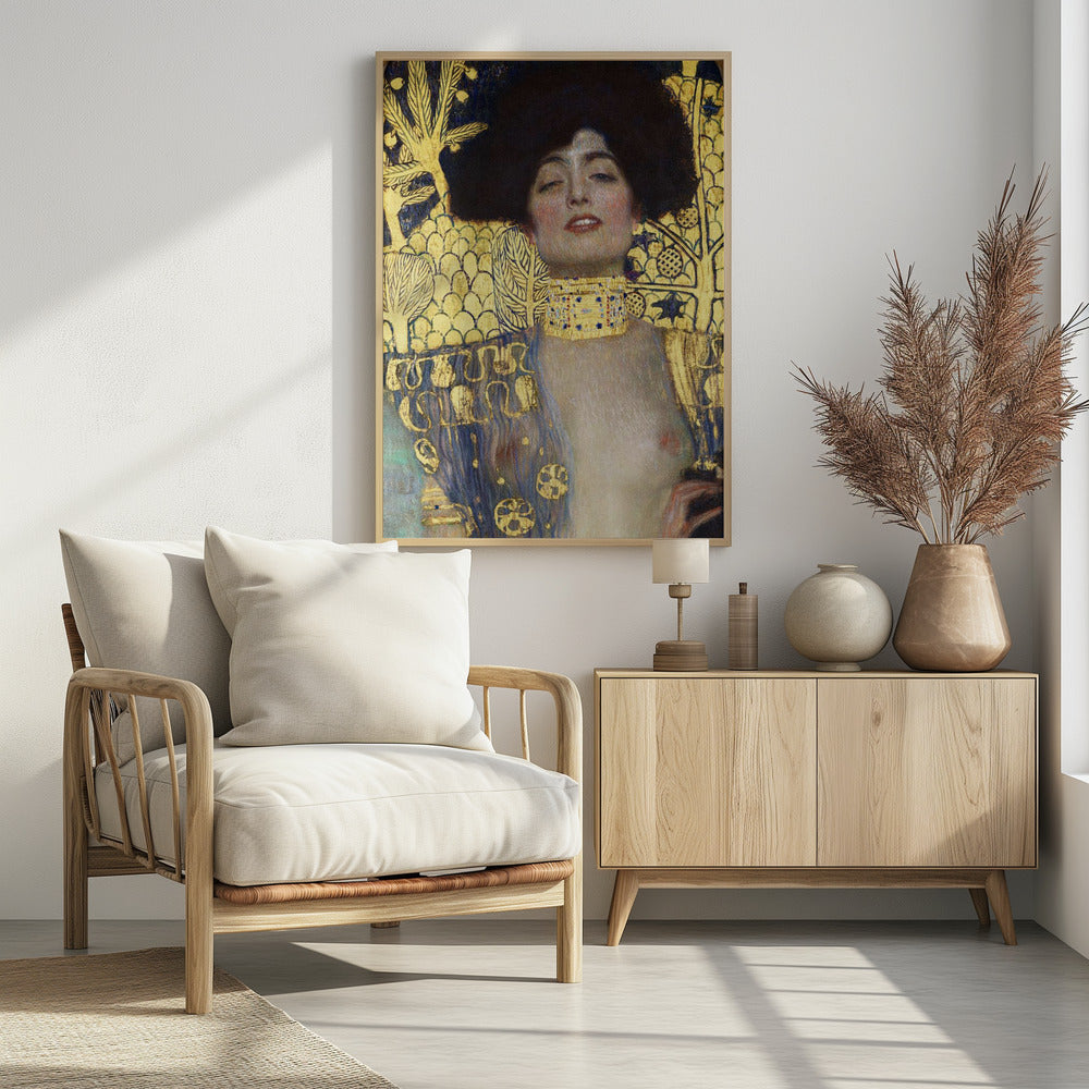 A vertical portrait painting by Gustav Klimt, 'Judith and the Head of Holofernes,' depicting a woman with voluminous dark hair and a sensual expression. She wears an elaborate gold and bejeweled choker, with a decorated blue and gold garment falling from her shoulders against a richly patterned gold leaf background. Artwork