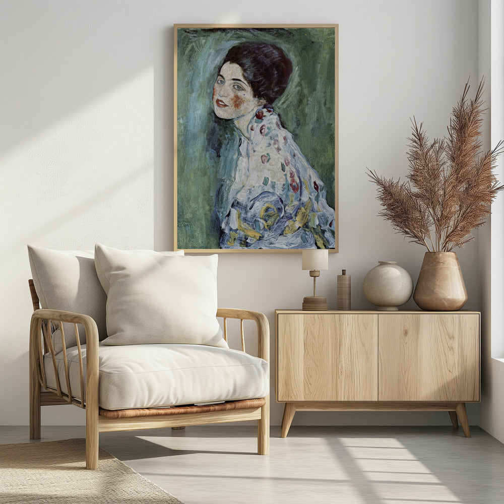 An expressionist portrait painting of a woman with dark hair, blue eyes, and red lipstick, looking back over her shoulder. She wears a patterned dress against a textured green and blue background. The artwork has visible, thick brushstrokes. Artwork