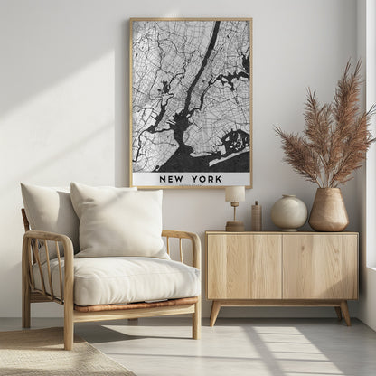 A minimalist black and white map of New York City. The land is depicted in white with a network of black lines for streets, while the rivers and bay are solid black. The artwork is enclosed in a thin black frame, and at the bottom, a white border contains the text 'NEW YORK' in a bold, black, sans-serif font. Wall Art