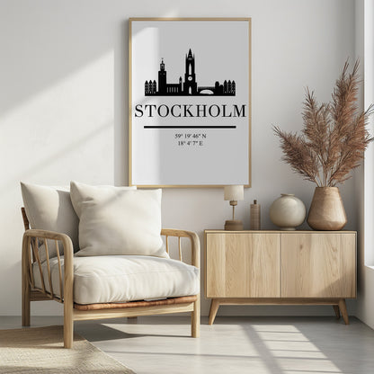 A minimalist black and white framed poster featuring a silhouette of the Stockholm skyline. Below the skyline, the word 'STOCKHOLM' is printed in large, bold letters, followed by its geographical coordinates. Wall Art