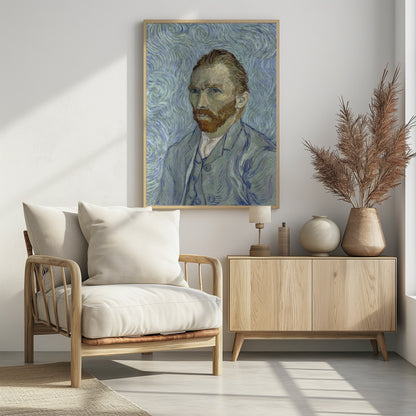 A framed post-impressionist self-portrait by Vincent van Gogh. He is depicted with a stern gaze, reddish hair and beard, and wearing a blue suit against a swirling light blue and white background, all rendered with thick, expressive brushstrokes. Print