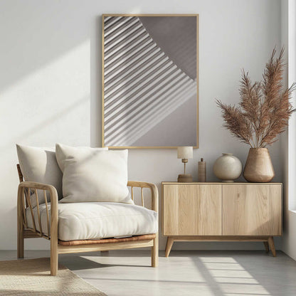 Abstract photograph of a ribbed surface with diagonal lines created by light and shadow, minimalist wall art.