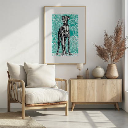 A framed linocut-style print of a black and white greyhound standing alert against a vibrant teal background patterned with stylized trees and foliage. Poster