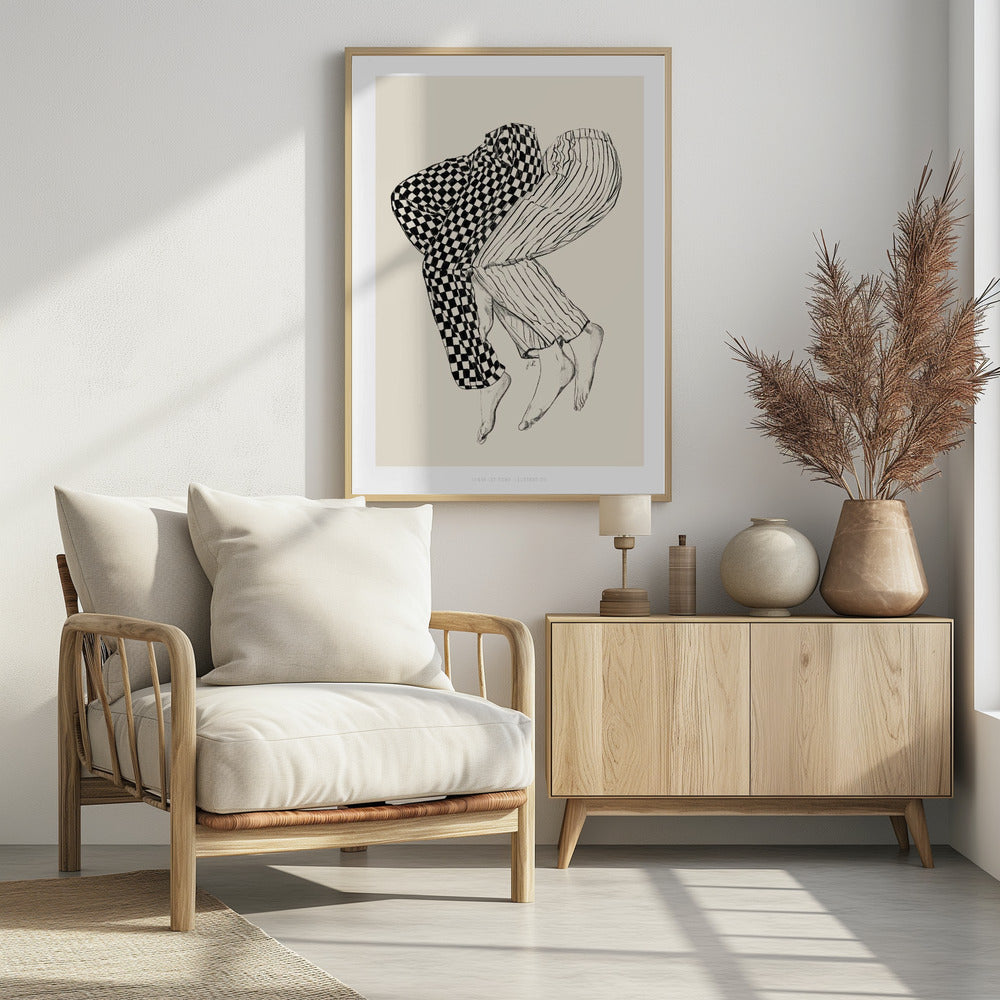 A black and white line drawing of the lower bodies of two people embracing. One figure wears checkered pajamas and the other wears striped pajamas. Their barefoot legs are intertwined and lifted, floating against a solid cream-colored background. Artwork