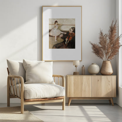 A framed impressionist painting by Edgar Degas titled 'The Dance Lesson'. The artwork depicts a young ballerina in a white tutu and red ribbon in her hair practicing at a ballet barre. In the foreground, a musician sits and plays the violin. Wall Art
