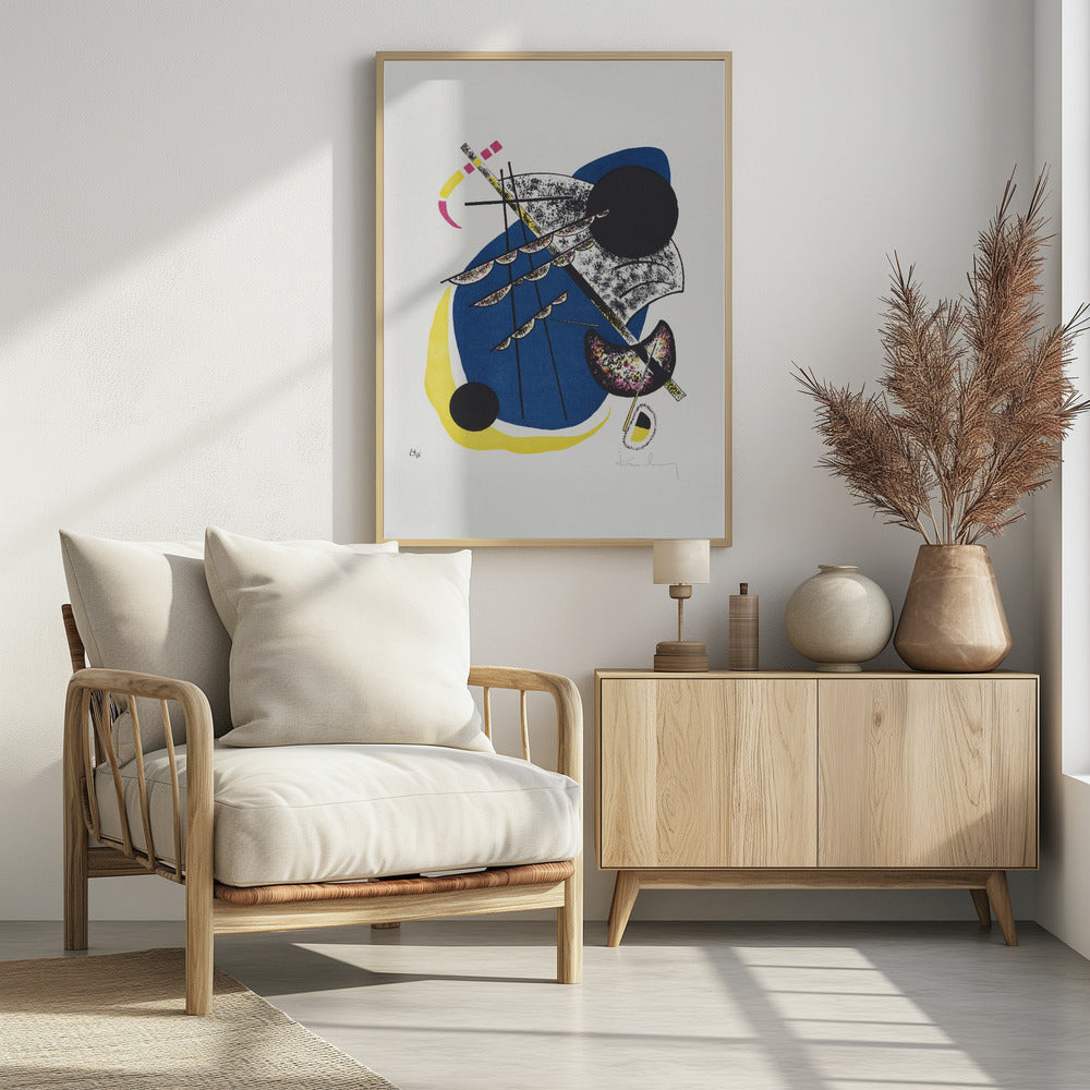 An abstract lithograph by Wassily Kandinsky in a black frame. The composition on a white background features a large central blue shape, a prominent black circle, and intersecting black lines. Accents of yellow, magenta, and speckled textures add complexity to the dynamic arrangement of geometric and organic forms. Decor