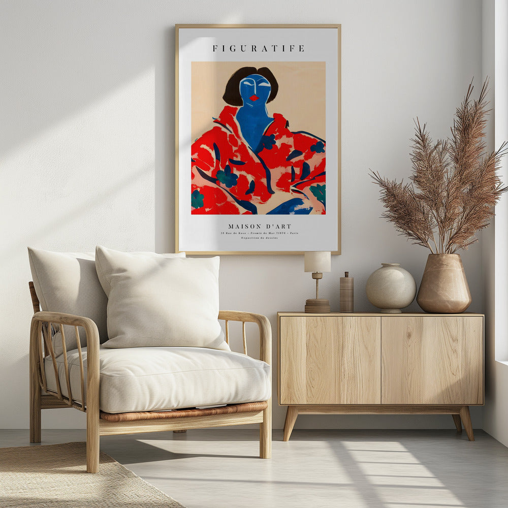 A vintage-style art exhibition poster with 'FIGURATIFE' at the top. The central artwork is an abstract portrait of a woman with a blue face and black hair, wearing a bold red floral patterned robe against a beige background. Below, text reads 'MAISON D'ART' and gives exhibition details. Artwork