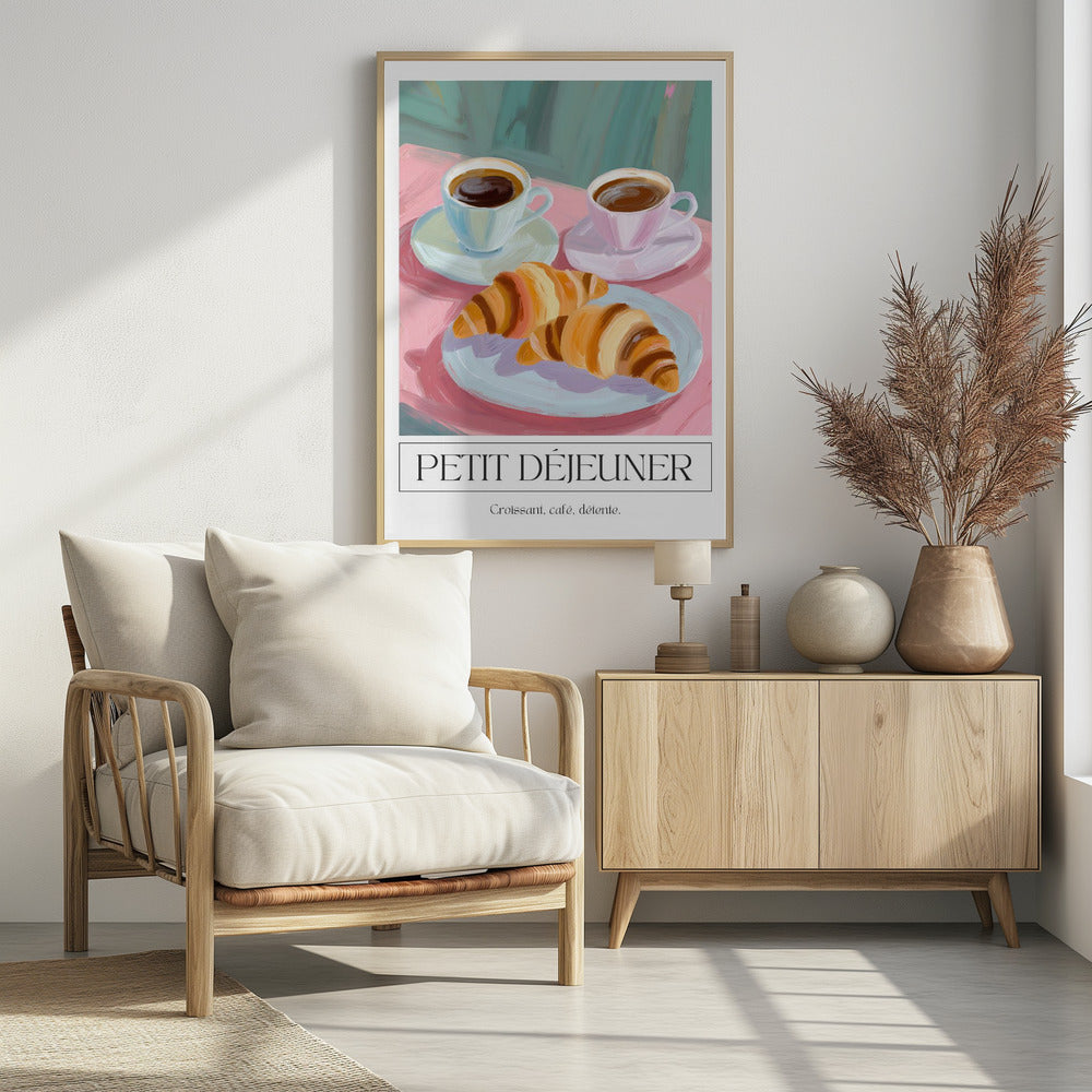 A painterly illustration of a French breakfast poster. The scene depicts two croissants on a light blue plate and two cups of coffee on a pink tablecloth against a teal background. Below the image, text reads 'PETIT DÉJEUNER' and 'Croissant, café, détente.' Print