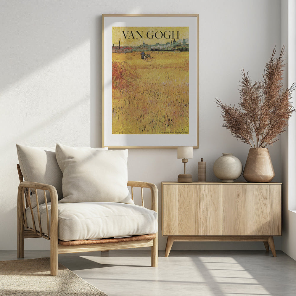 A framed poster of Vincent van Gogh's painting 'Wheat Field with View of Arles'. The impressionist artwork features a vast, textured golden wheat field with harvesters, and the city of Arles in the background. The title 'VAN GOGH' is printed prominently at the top. Decor