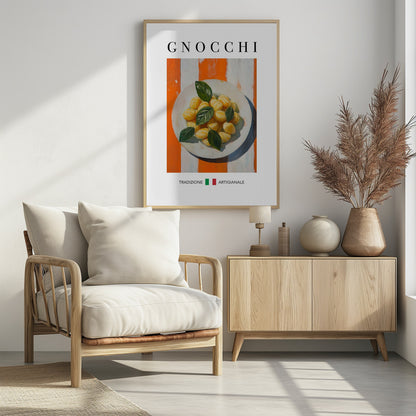 A framed poster featuring a painted illustration of a plate of gnocchi with fresh basil. The background has bold orange and white vertical stripes. The word 'GNOCCHI' is at the top, and 'TRADIZIONE ARTIGIANALE' with an Italian flag is at the bottom. Decor