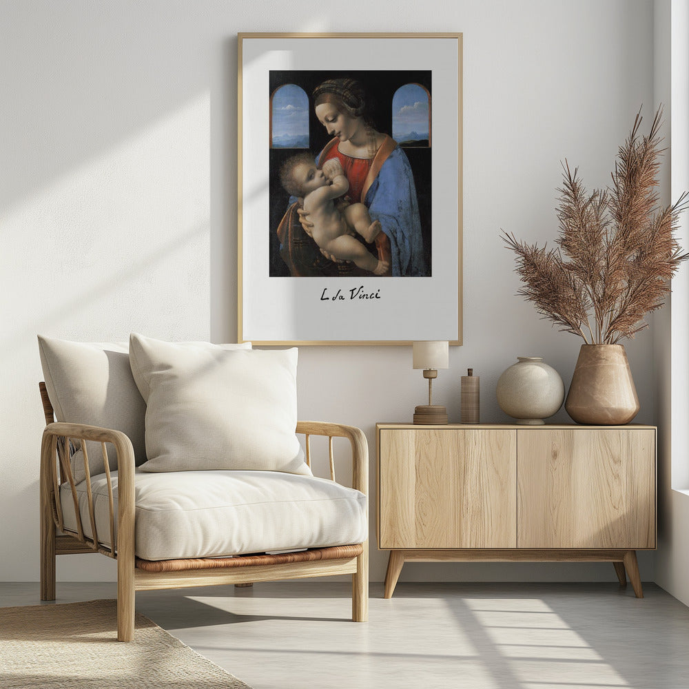 A framed art print of Leonardo da Vinci's painting 'Madonna Litta,' featuring the Virgin Mary in a red dress and blue cloak breastfeeding the infant Jesus. They are framed by two arched windows showing a distant landscape, all set within a black frame with white matting. Wall Art