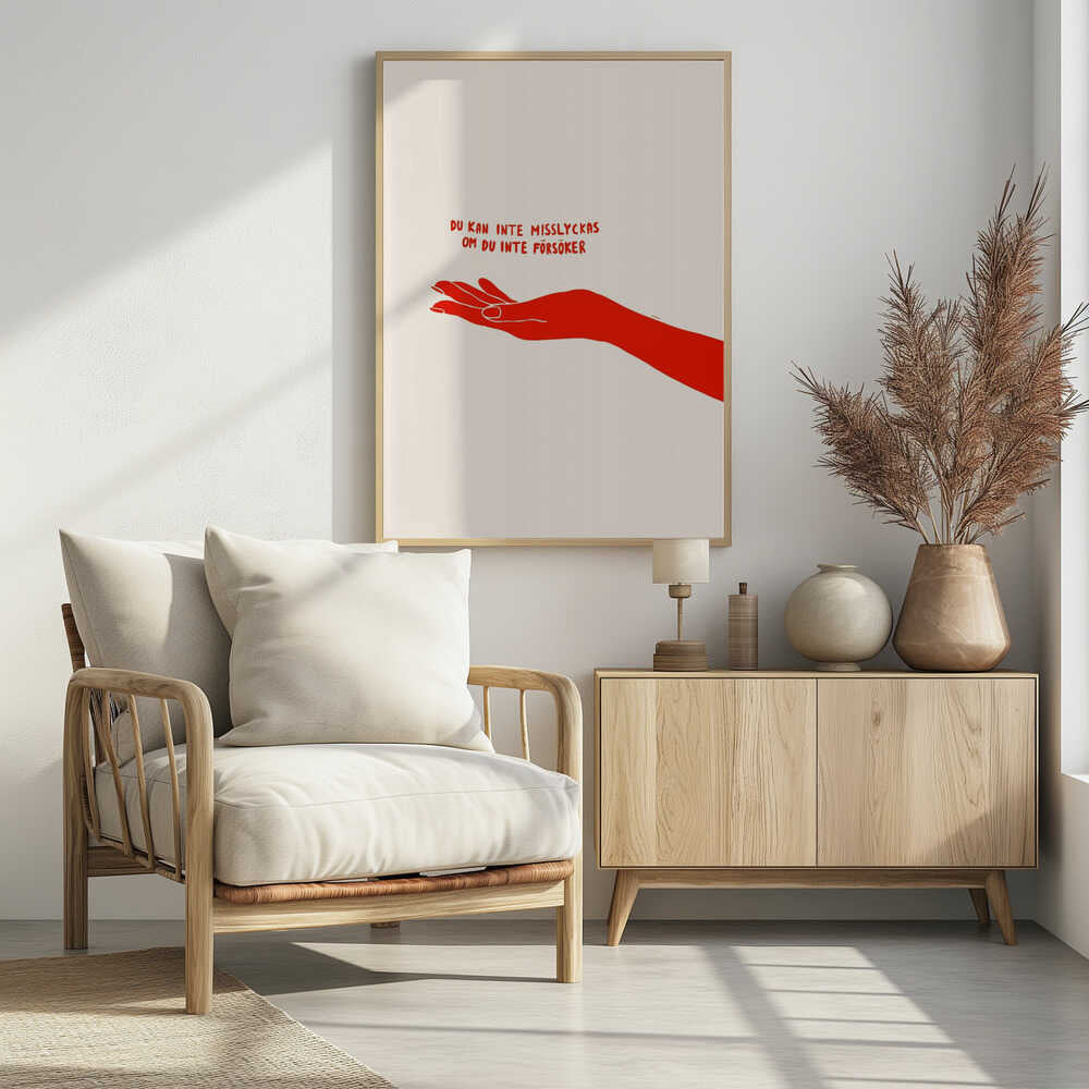A minimalist poster with a cream background in a black frame. It features a stylized red illustration of an outstretched hand, palm up. Above the hand, red text in a casual font reads 'DU KAN INTE MISSLYCKAS OM DU INTE FÖRSÖKER,' which is Swedish for 'You can't fail if you don't try.' Poster