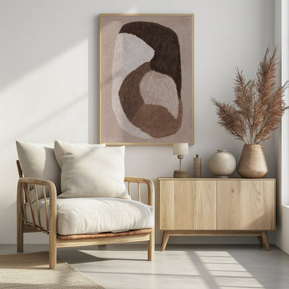 An abstract painting in a black frame featuring large, interlocking organic shapes in dark brown, off-white, and a lighter mid-tone brown. The shapes are painted with visible brushstrokes on a textured, light beige background, creating a sense of movement and warmth. Artwork