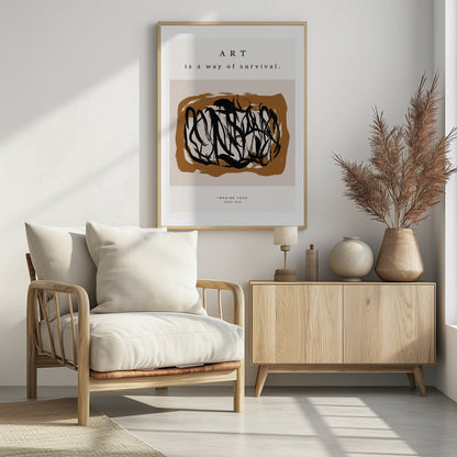 A minimalist art print in a black frame featuring the quote 'ART is a way of survival.' at the top. Below the text is an abstract composition of energetic black brushstrokes on a brown and beige background. At the bottom, it's credited to Yoko Ono with the text '"IMAGINE YOKO" yoko ono'. Artwork