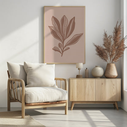 A minimalist botanical art print featuring a stylized plant in a muted brown, block-print style against a dusty pink background. Some leaves are solid while others have a striped pattern. The artwork is presented in a simple black frame. Decor