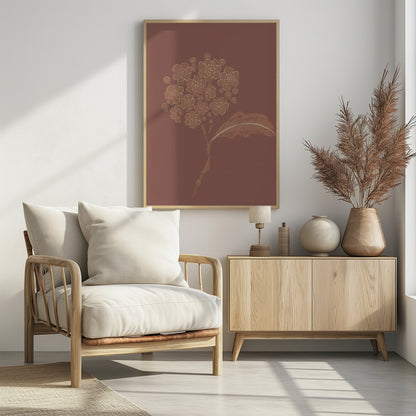 A stylized illustration of a single flower stalk with a round cluster of blossoms, similar to a hydrangea. The artwork is created in a limited palette of terracotta and cream against a solid dusty rose background, giving it a minimalist, block-print feel. The image is presented within a simple black frame. Decor