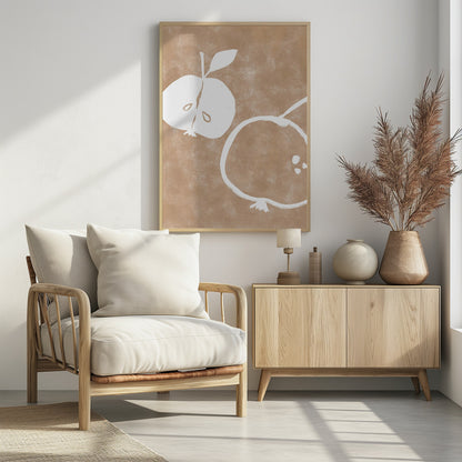 A minimalist artwork in a black frame featuring two stylized white apples on a textured light brown background. One apple is cut in half showing its seeds, and the other is a simple outline of a whole apple. Decor