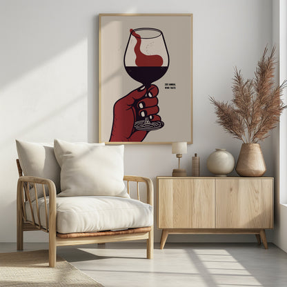 A vintage-style graphic poster advertising the '21st Annual Wine Taste'. A stylized red hand holds a wine glass filled with dark red wine, which is being swirled, creating a dynamic splash against a light beige background. Decor