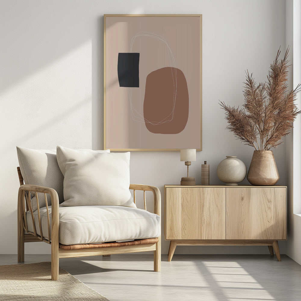 A minimalist abstract artwork in a black frame. The piece features a dark charcoal rectangle and a larger, organic terracotta brown shape on a dusty pink background. A thin, white, scribbled line loops loosely around both shapes, connecting them. Decor