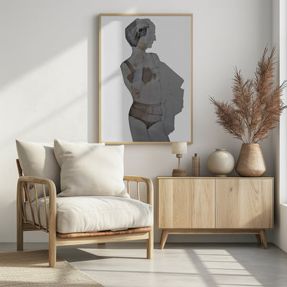 A modern abstract painting of a woman in a black frame. The figure is depicted in layered, translucent shades of gray, black, and brown against a white background. She has short dark hair and is wearing lingerie, looking away to the side. Wall Art
