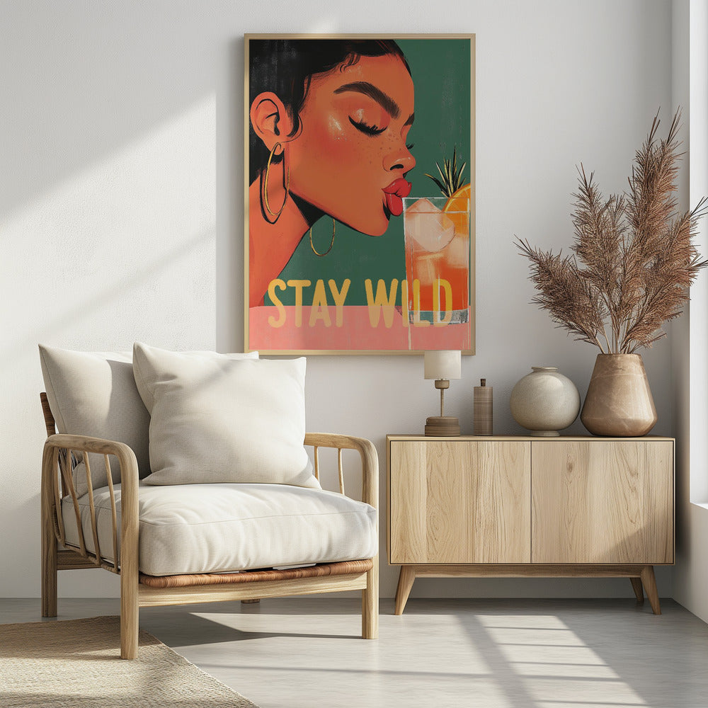 A vibrant illustration of a woman with dark hair and gold hoop earrings, closing her eyes as she leans in to sip a refreshing orange cocktail. The words 'STAY WILD' are written in bold yellow font across the bottom of the image. Print