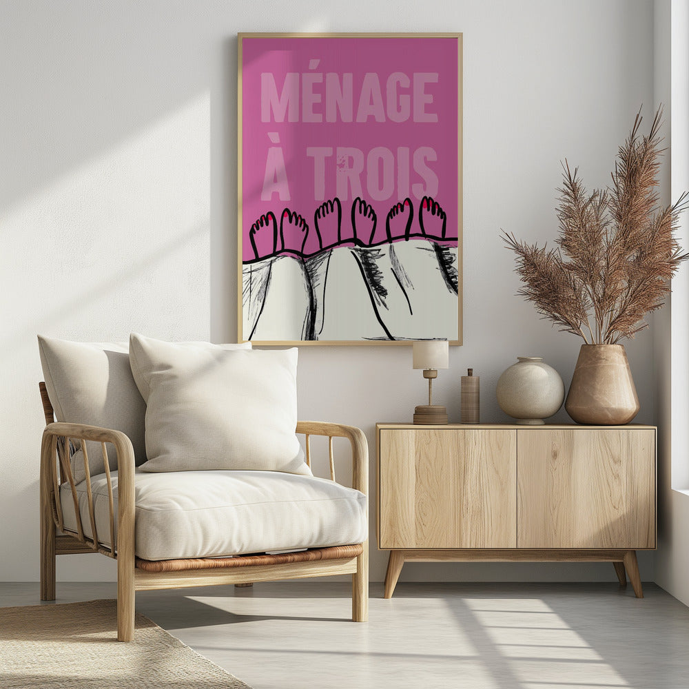 A humorous graphic poster with a pink background and the French phrase 'MÉNAGE À TROIS' in a lighter pink font. At the bottom, three pairs of illustrated feet stick out from under a white blanket, with two feet having red toenail polish. Print
