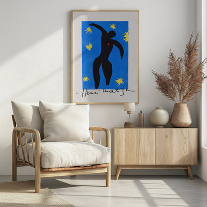 Henri Matisse's 'Icarus,' a framed print featuring a black paper cutout silhouette of a falling figure with a red heart, set against a deep blue background with yellow starbursts. The artist's signature is visible at the bottom. Poster