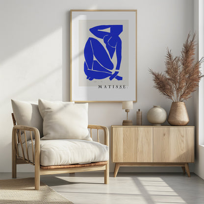 A framed art print of Henri Matisse's 'Blue Nude III', featuring a vibrant blue paper cut-out of a seated nude woman against an off-white background. Poster